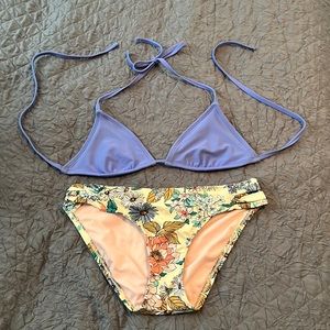 Bikini 2 piece. Floral bottoms and lavender triangle top.